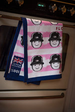 Fred pink tea towel by Tom Hovey