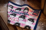 Fred pink tea towel by Tom Hovey